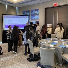 Secondary students gathered in a room for discussion